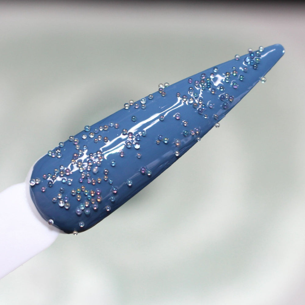 Tooth Of A Troll Caviar Beads (0.6-0.8mm) by GlitterLambs.com. Nail swatch over Salon Perfect "Way Back When" 183 nail polish color.