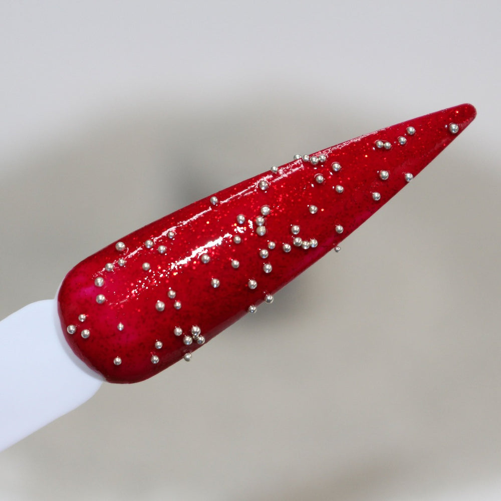 Armadillo Bile Caviar Beads (0.6-0.8mm) by GlitterLambs.com Great for nails, shaker cards, etc. Swatched over a nail using Salon Perfect "He's With Me" red nail  polish.