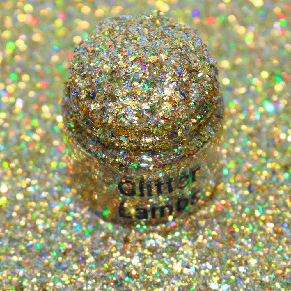 Gold holographic shard glitter called “Dear Santa, Define Good!,” packaged in a 5 gram bag, part of the Christmas Is Here glitter collection, perfect for nails, resin art, tumblers, ornaments, hair, body, and holiday crafts.