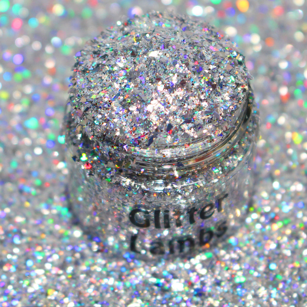 Silver holographic shard-cut glitter called “Don’t Make Me Text Santa,” packaged in a 5 gram bag, part of the Christmas Is Here glitter collection, perfect for nails, resin art, tumblers, and holiday crafts.
