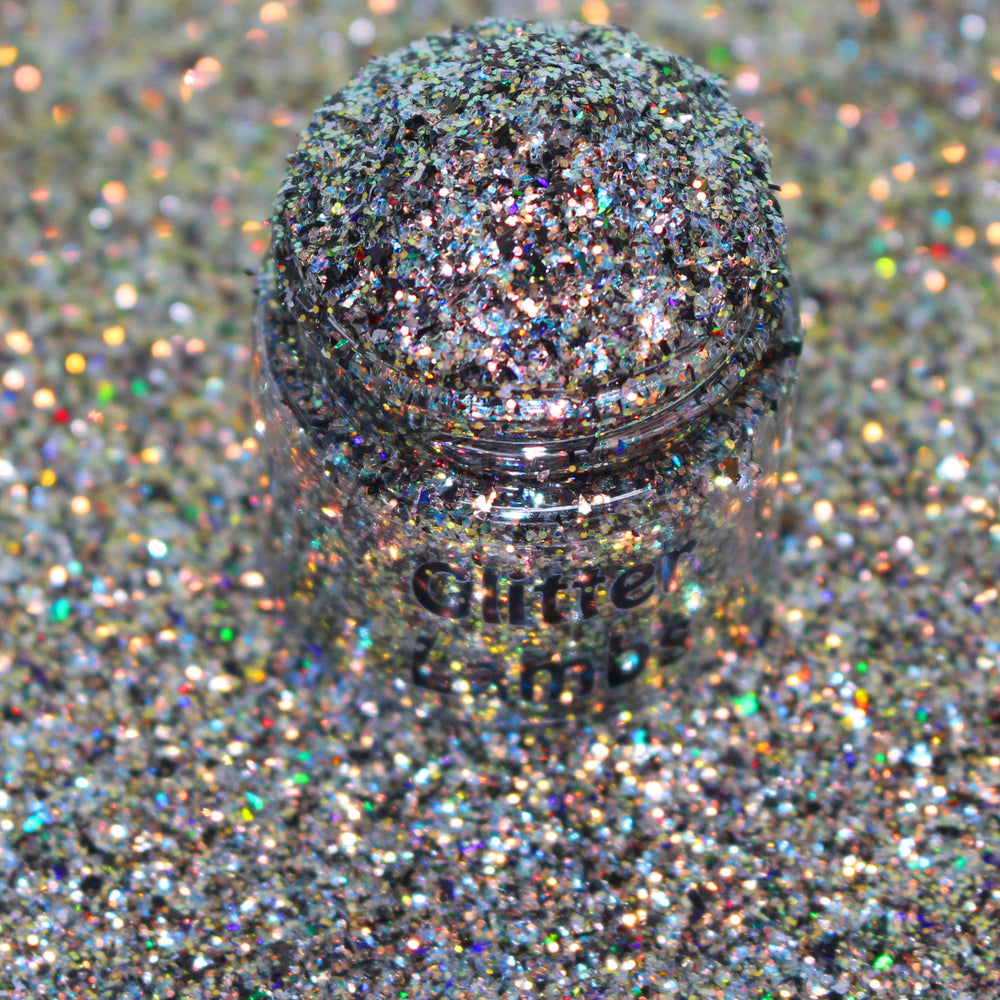 Gold holographic glitter with blue accents called “I Run On Coffee & Christmas Cheer,” packaged in a 5 gram bag, part of the Christmas Is Here glitter collection, perfect for nails, resin art, tumblers, ornaments, hair, body, and holiday crafts.