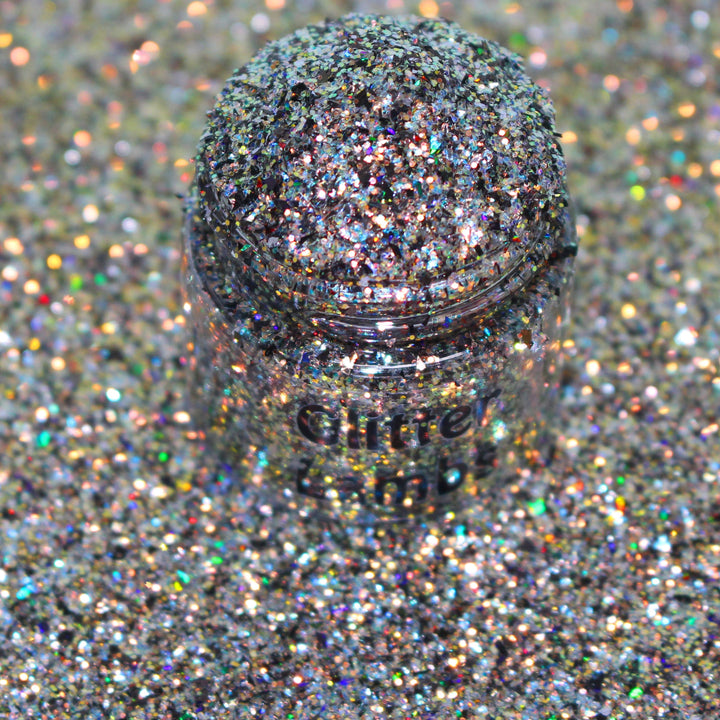 Gold holographic glitter with blue accents called “I Run On Coffee & Christmas Cheer,” packaged in a 5 gram bag, part of the Christmas Is Here glitter collection, perfect for nails, resin art, tumblers, ornaments, hair, body, and holiday crafts.