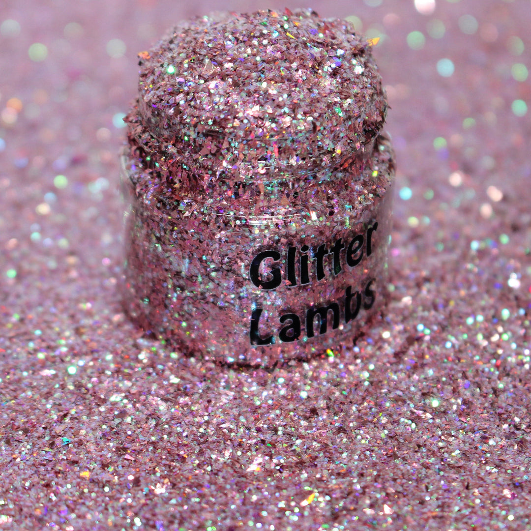 Pink holographic shard-cut glitter called “Keep Your Holiday Diet Balanced…A Cookie In Each Hand,” packaged in a 5 gram bag, part of the Christmas Is Here glitter collection, perfect for nails, resin art, tumblers, ornaments, and holiday crafts.