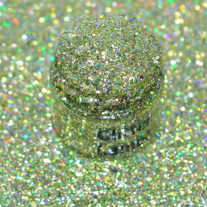 Gold holographic shard glitter called “Pour Me Some Holiday Cheer,” packaged in a 5 gram bag, part of the Christmas Is Here glitter collection, perfect for nails, resin art, tumblers, ornaments, hair, body, and holiday crafts.