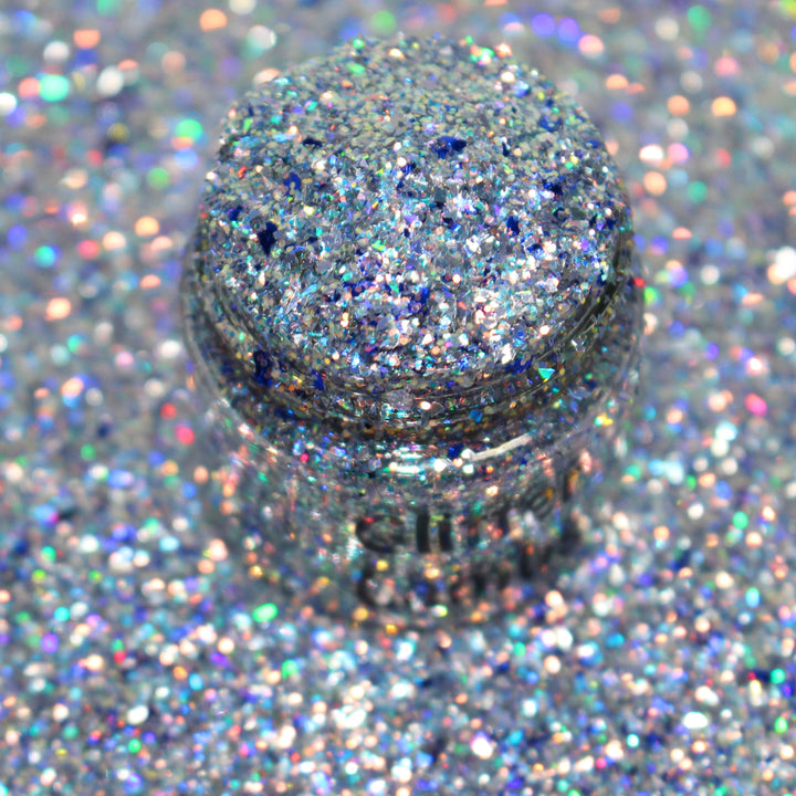 Lilac purple holographic shard glitter called “Santa I Was Framed,” packaged in a 5 gram bag, part of the Christmas Is Here glitter collection, perfect for nails, resin art, tumblers, ornaments, hair, body, and holiday crafts.