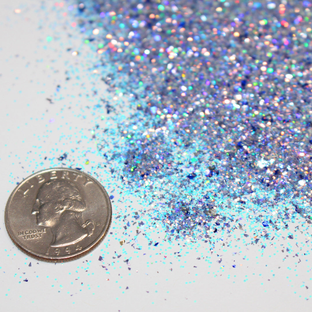 Lilac purple holographic shard glitter called “Santa I Was Framed,” packaged in a 5 gram bag, part of the Christmas Is Here glitter collection, perfect for nails, resin art, tumblers, ornaments, hair, body, and holiday crafts.