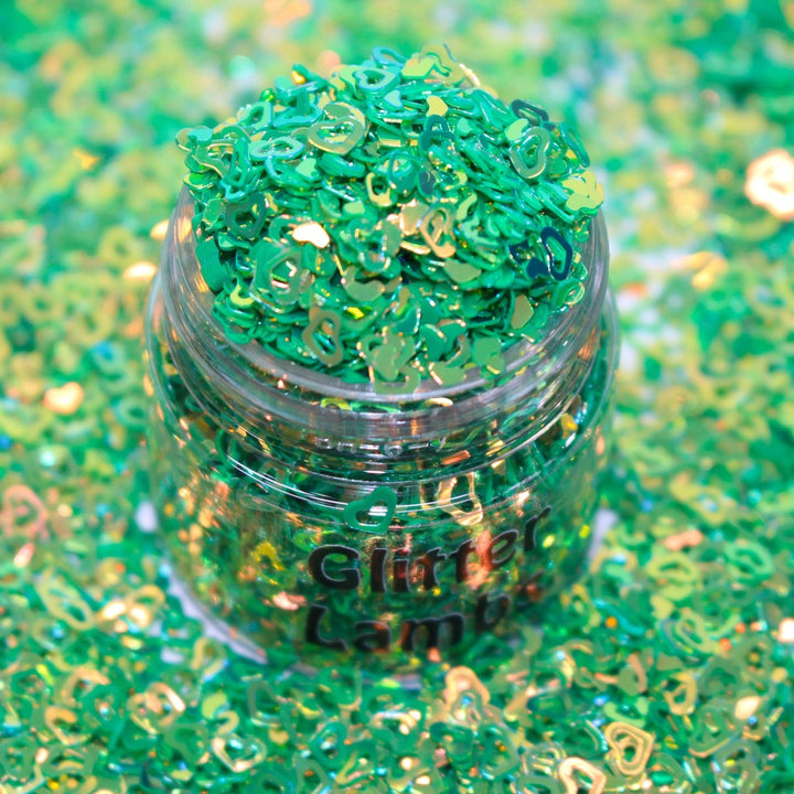 Seaweed is a green sequin plastic hollow heart glitter by GlitterLambs.com. Great for arts crafts, shaker cards, resin shakers, shaker Hair bows, snowglobe tumbler cups, snowglobe pens, resin, etc.