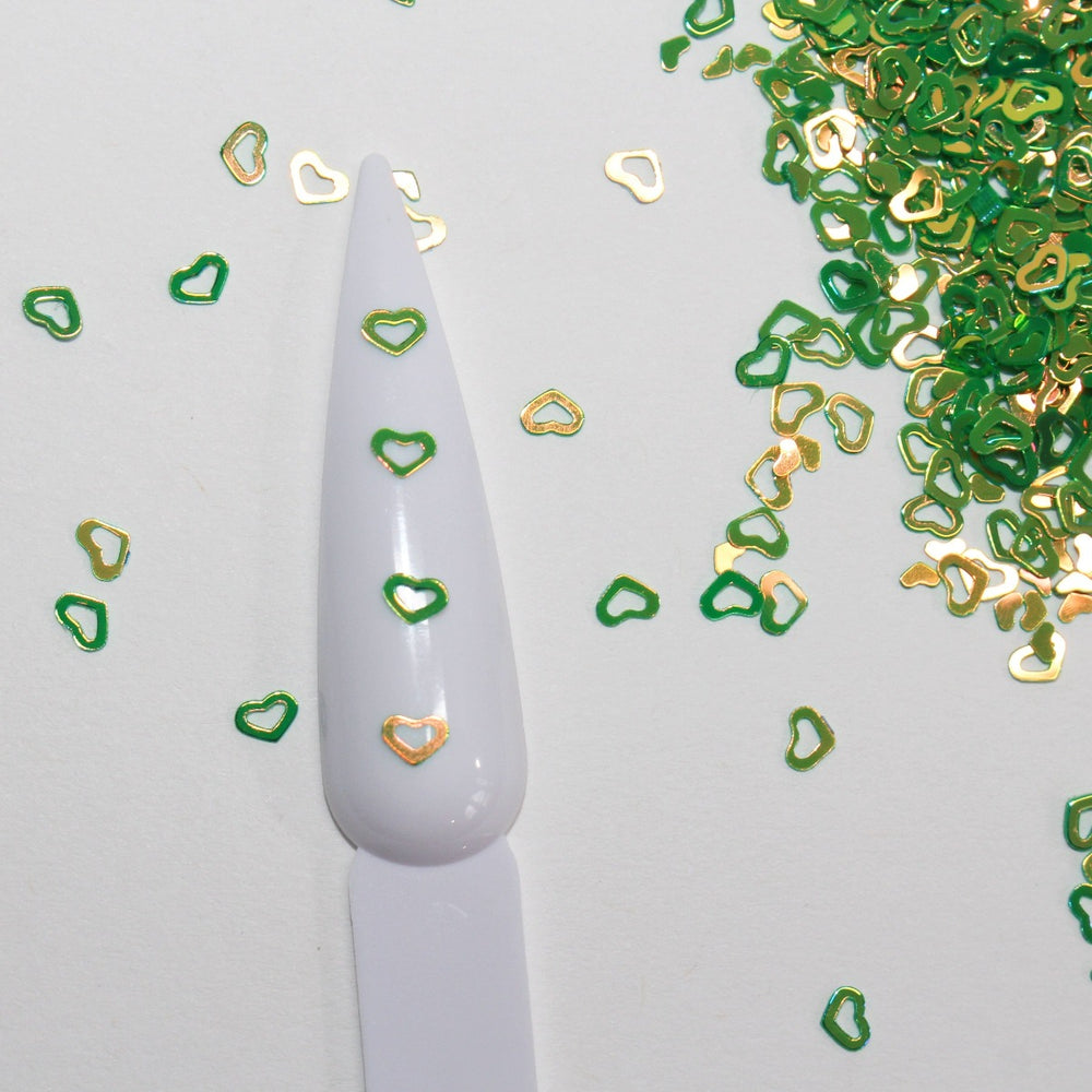Seaweed is a green sequin plastic hollow heart glitter by GlitterLambs.com. Great for arts crafts, shaker cards, resin shakers, shaker Hair bows, snowglobe tumbler cups, snowglobe pens, resin, etc.