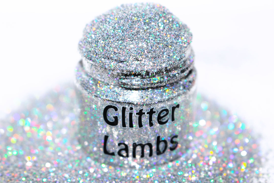 Twinkle The Star...Sucker glitter is a silver holographic glitter size .008. Great for crafts, nails, resin, tumbler cups, acrylic pouring, body, hair, etc. Jar is 15mL. by GlitterLambs.com