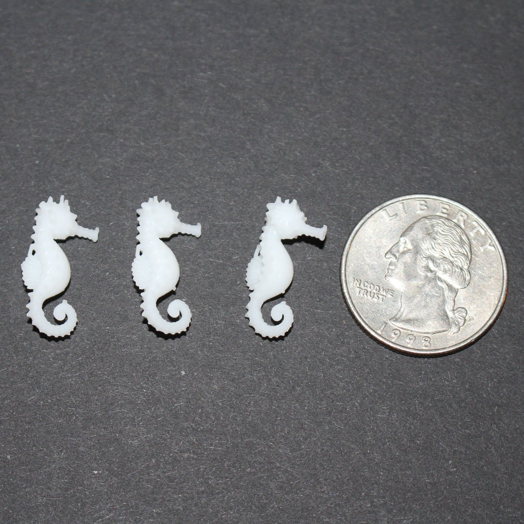 Tiny plastic seahorse miniatures 